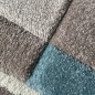 Preview: Designer Teppich mit Konturenschnitt Karo Muster Pastellfarben Blau Creme Beige Dunkelgrau