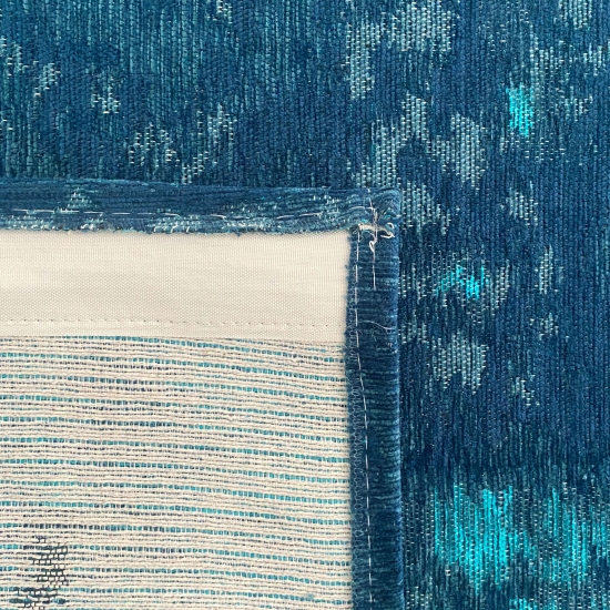 Wohnzimmer Teppich abstraktes Muster blau weiß grau