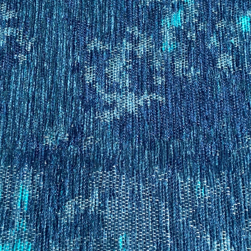 Wohnzimmer Teppich abstraktes Muster blau weiß grau