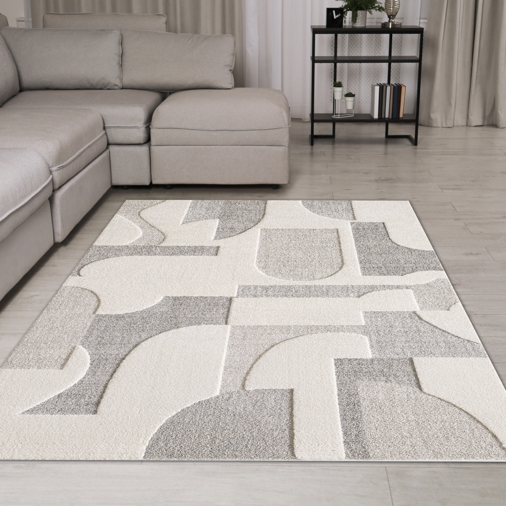 Designer Teppich in Creme mit geometrischen Mustern